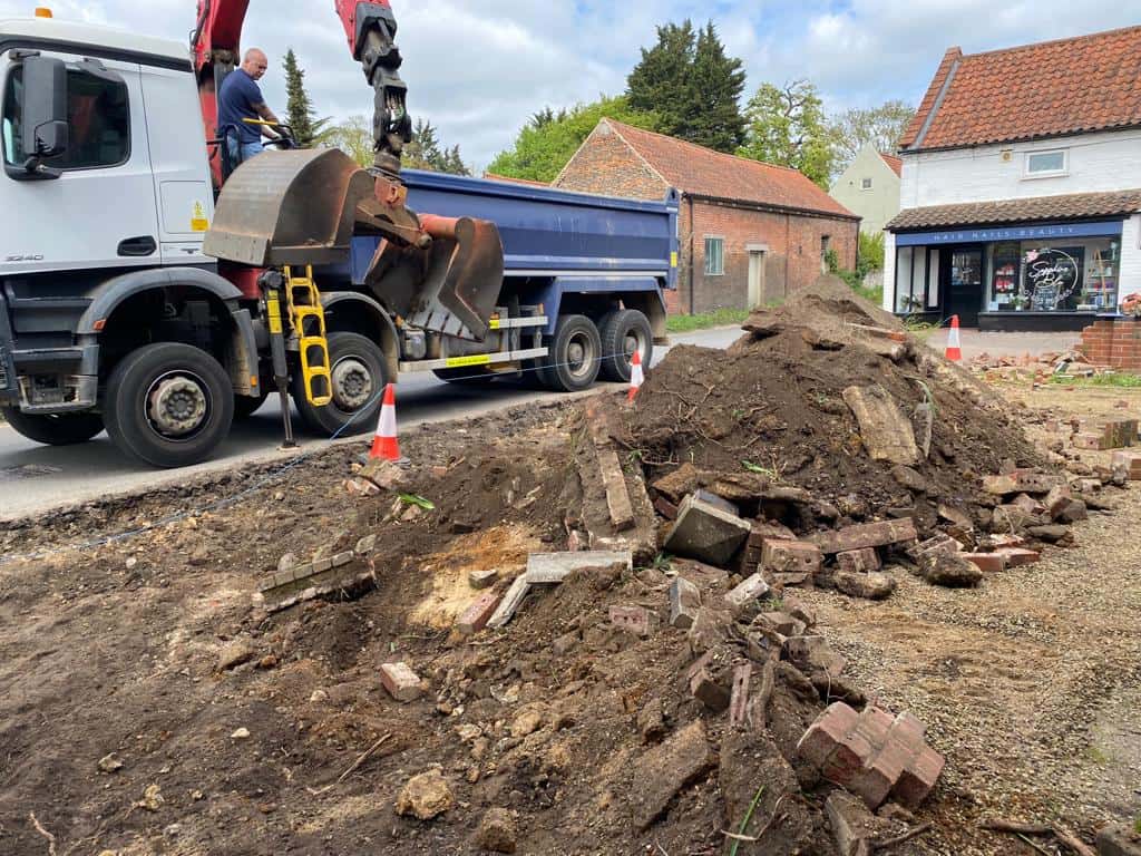 This is a photo of a dig out being carried out for the installation of a new tarmac driveway. Works being carried out by Isleham Driveways