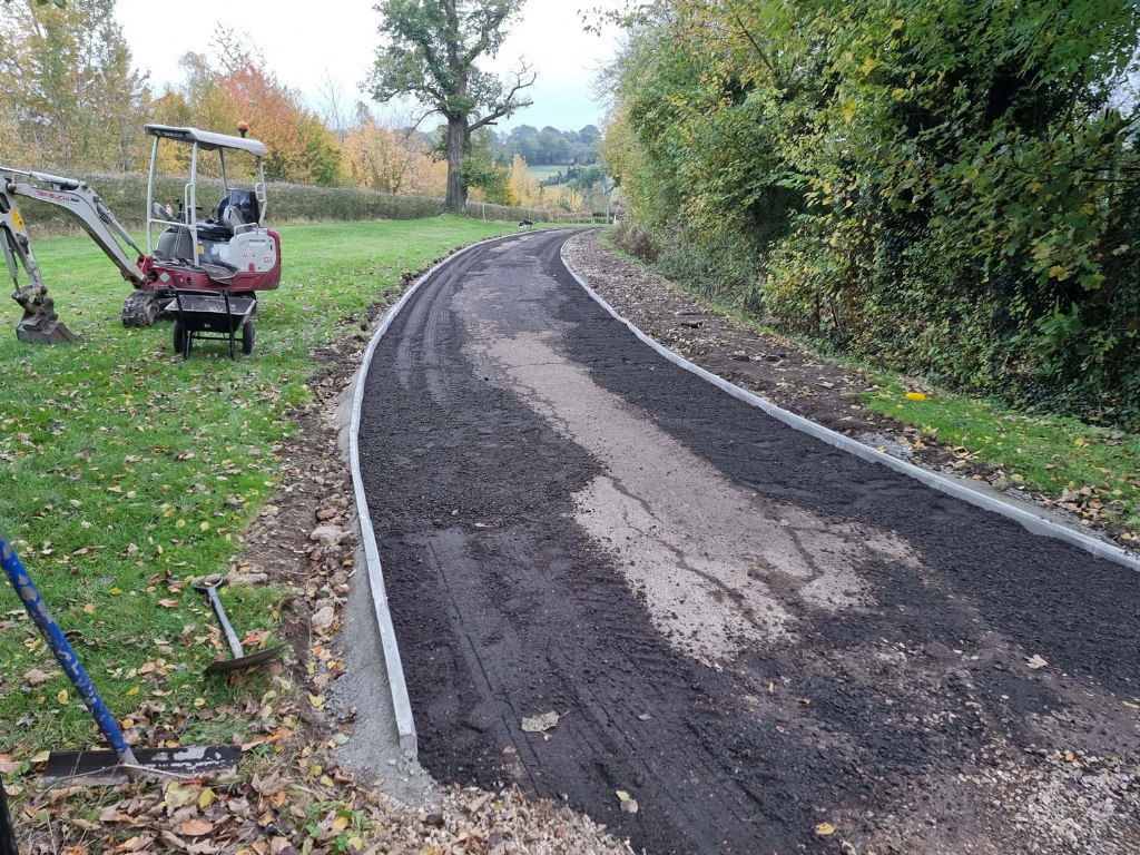 This is a large driveway which is in the process of having a tar and chip driveway installed on by Isleham Driveways