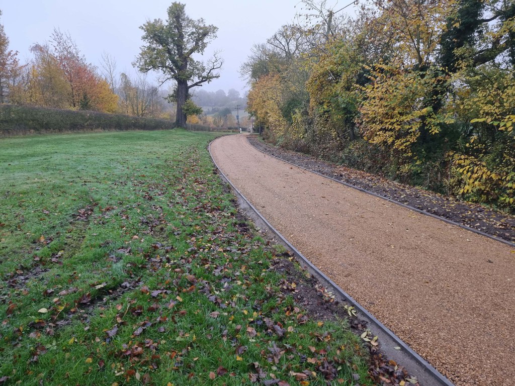 This is a large driveway which has just had a tar and chip driveway installed on by Isleham Driveways